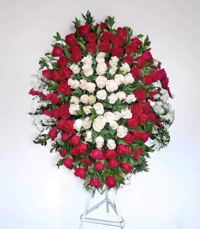 arreglo-floral-de-condolencias-ambato-con-rosas-rojas-1.jpg Arreglo de condolencias con rosas rojas - Imagen 1